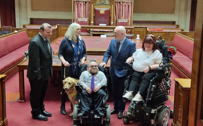 In the Senate Chamber at Parliament Buildings Belfast.

Dave Morton, June Best and her guide dog, Dermot Devlin and Michaela Hollywood, talking to the Northern Ireland Assembly Speaker Alex Maskey