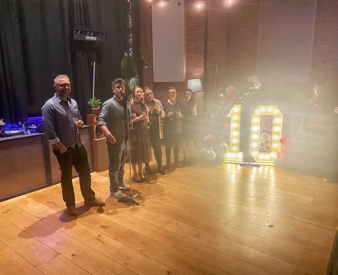 Founder of The Generator Hub, Neil Finnie, giving a speech during their 10th celebrations at The Hall in Exeter.