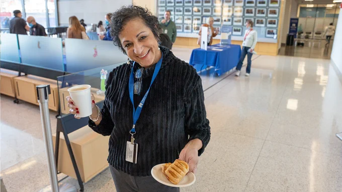 Employee holds up a free treat