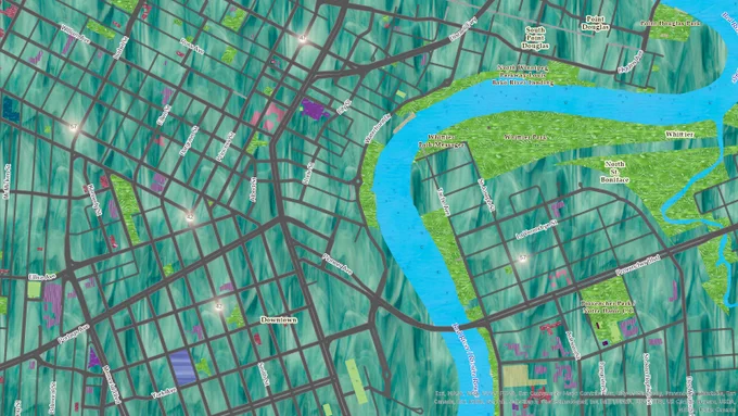 The meandering river of Winnipeg, Manitoba, and the surrounding built urban environment of the city have been made to look like a stained glass window with different colour (purple, blue, pink, purple) glass and sparkles indicating highway labels. 