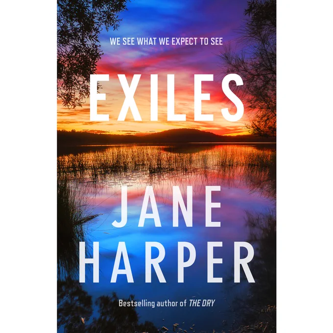 Cover of the book "Exiles" by Jane Harper. Cover depicts a watery area (dam, pond, creek, river, etc.), with hills on the horizon, and a reflected sunset colouring both the sky and the water very vividly in hues of blue, purple, pink, and orange.