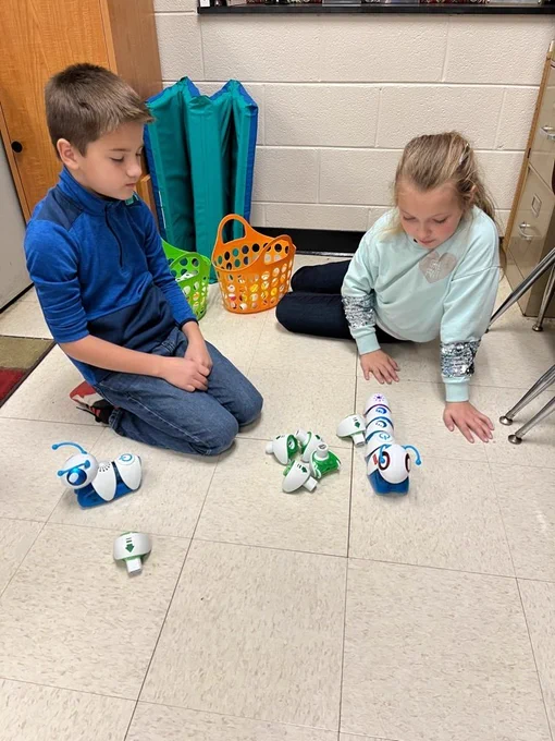 Students decide which direction they want their code-a-pillar to go  