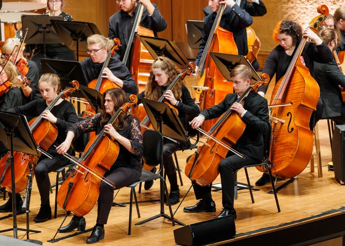 Members of the University and Community Orchestra's string section play Purdue Fort Wayne's Home for the Holidays concert.