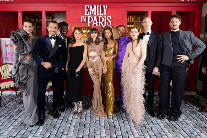 The cast of Emily in Paris on the red carpet of the Season 3 premiere