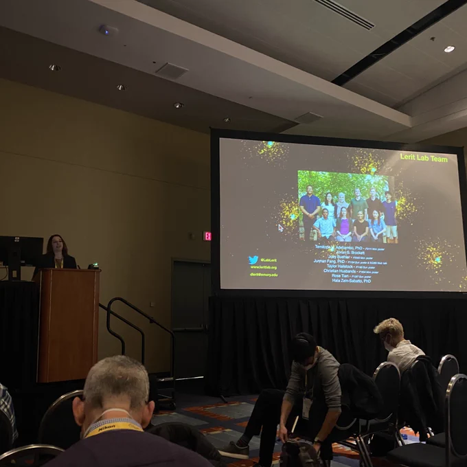 Dorothy standing behind the podium at the ASCB minisym acknowledging her lab for their efforts leading to the Gunter Blobel Award