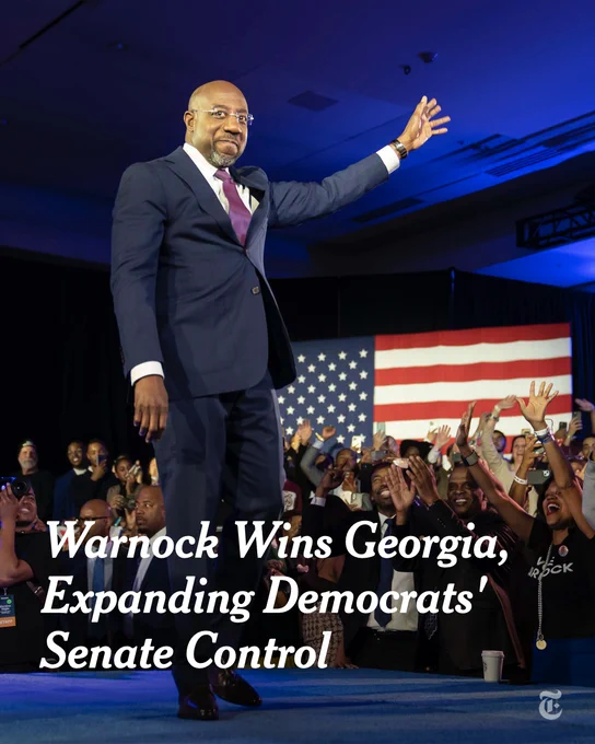 Senator Raphael Warnock smiles and waves to a crowd from a stage on Tuesday night in Atlanta after winning Georgia’s Senate runoff election.