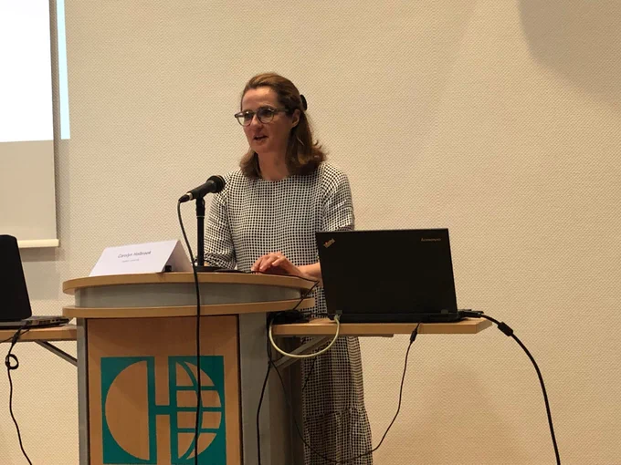Carolyn Holbrook presenting a paper on concepts of security within the national insurance debate in the interwar years