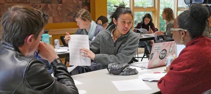 Stephanie Ichien (center), the research and scholars coordinator at Oregon Sea Grant, offers help during a 2019 information session for students interested in applying for fellowships and internships that Oregon Sea Grant helps place applicants in. (photo by Tiffany Woods)