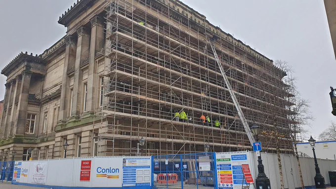 Harris Your Place Project construction shows scaffoldings on the side exterior of the building 
