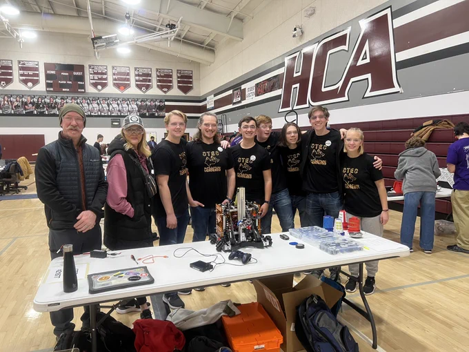 This is a pic of the robotics team with their coach/instructor and two administrators.
