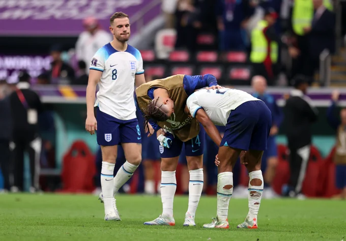 Jordan Henderson, Kalvin Phillips and Jude Bellingham after the defeat to France.
