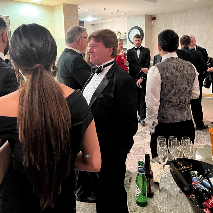 Managing Director welcoming guests.