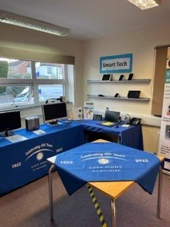 PHOTO OF OUR RESOURCES ROOM SMART TECH SECTION WHICH HAS IPHONE, IPADS, SAMSUNG, ANDROID DEVICES AS WELL AS OTHER SPECIALIST EQUIPMENT AND TECHNOLOGYU TO ASSIST VISUALLY IMPAIRED AND BLIND PEOPLE.