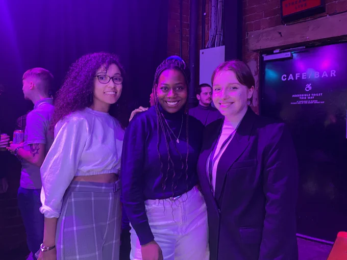 Three Content Creative trainees smile for the camera