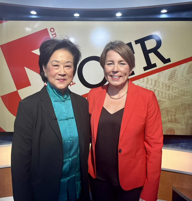 Photo of Maura Healey standing next to Janet Wu
