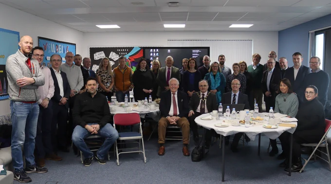 Attendees and representatives pictured with Bob Barbour (middle), CEO of Smart Grid Ireland and Centre for Competitiveness at our Energy Community workshop in Lisnaskea.