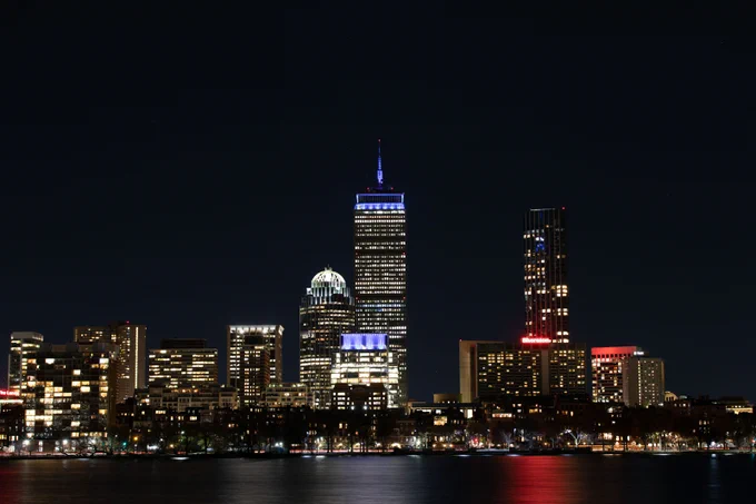 The Prudential Center sports a blue top and towers over Boston's Back Bay skyline.