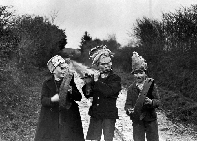 Photograph of three Wren Boys taken in West-Limerick in 1947