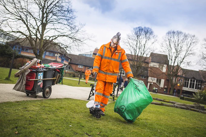  stafford council worker collecting litter