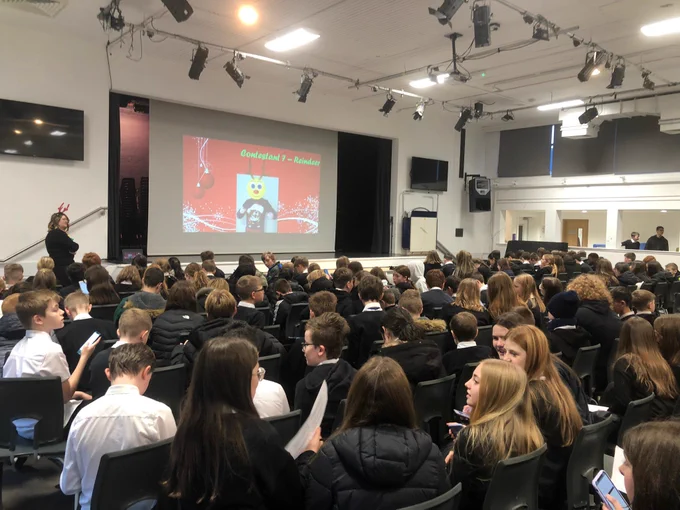 S1 pupils in the assembly hall taking part inThe Festive Masked Singer!
