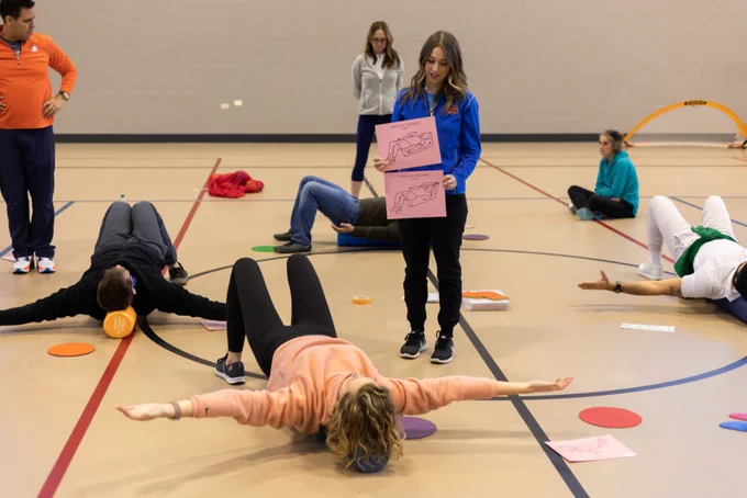 Photo: Learners participate in an exercise to complete their Autism Exercise Specialist Certificate training