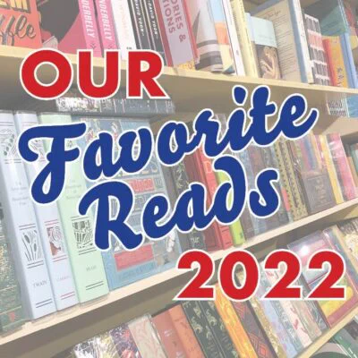 A shot of some bookshelves in our The Hague store, slightly whited out, with a text overlay that says "Our Favorite Reads 2022".