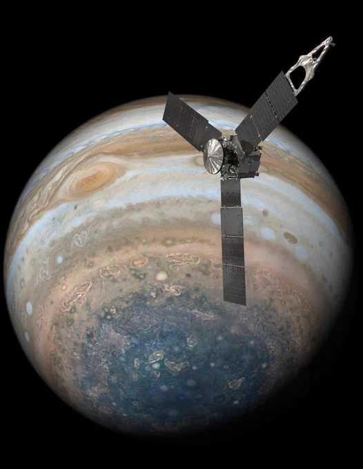 An illustration of Juno in orbit around Jupiter. The spacecraft has three large solar arrays that extend radially from the center of the spacecraft in a fan-like pattern. Jupiter can be seen in the background with its colorful cloud bands and swirling storms in its atmosphere.