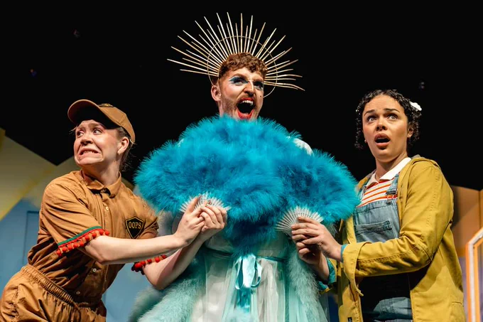 Three characters from The Snow Queen on stage in Wrongsemble's production.