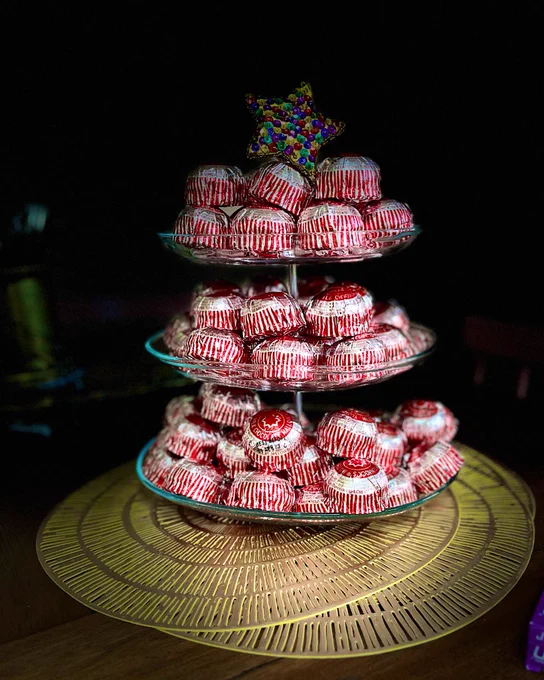 A three tier platter of Tunnocks Teacakes with a sequinned star atop.