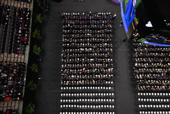 Clemson’s Littlejohn Coliseum during graduation from the ceiling.