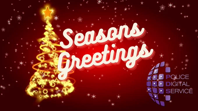 Seasons Greeting from PDS on a star covered red background with a golden Christmas tree