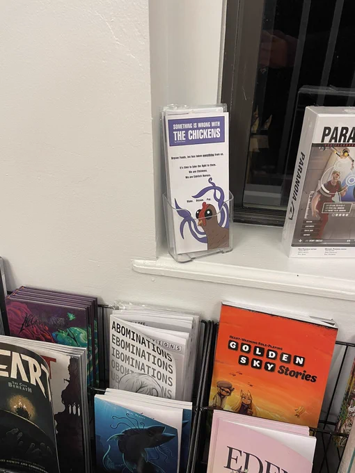 Shot of magazine display shelves full of ttrpg rule books