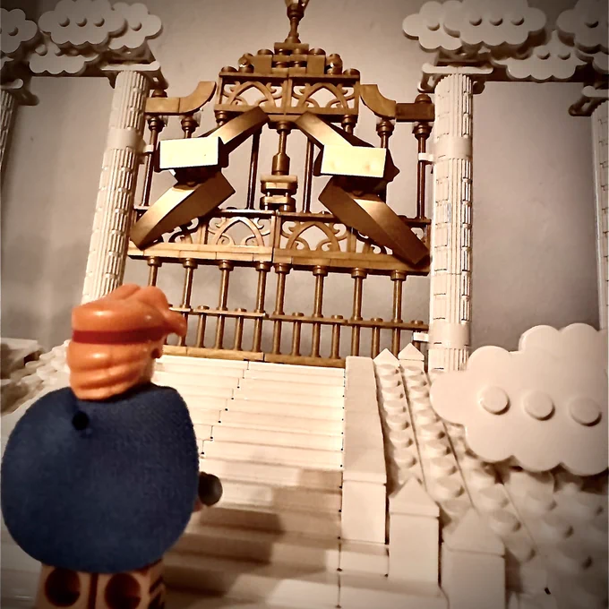Lego Hercules stands looking at the gates to Olympus from disneys Hercules