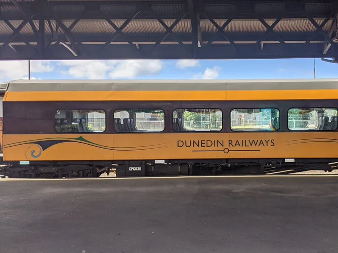 Yellow Dunedin Railways tourist train