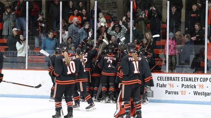 Team celebrates with fans