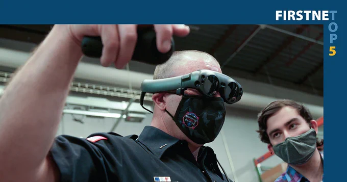 "FirstNet Top 5;" A fireman using augmented reality glasses