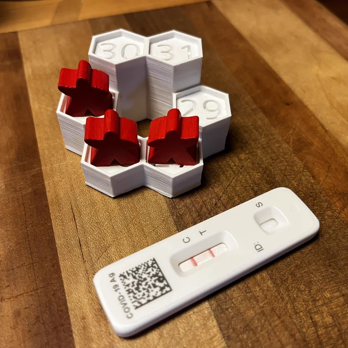 SpielMas display matching three days next to a positive COVID test.