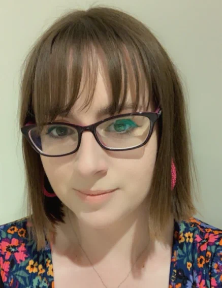 Image of a lady with glasses