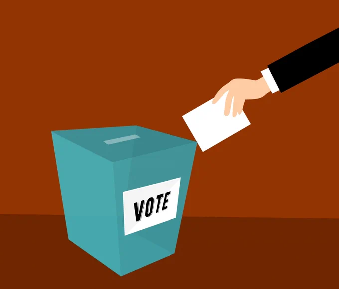 A cartoon ballot box with a hand coming in to place a vote.

Source: https://www.publicdomainpictures.net/en/view-image.php?image=264206