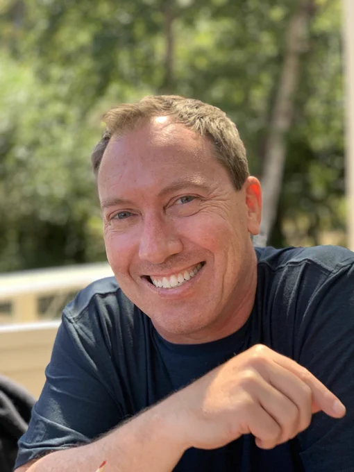 Picture of me: white guy in his 40s, short brown hair, dark green t-shirt, and I'm smiling