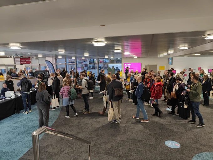 Queue at registration desk