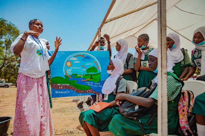 A stall explaining and showing the need to protect fresh water bodies during the Climate Change Solutions Festival in The Gambia
