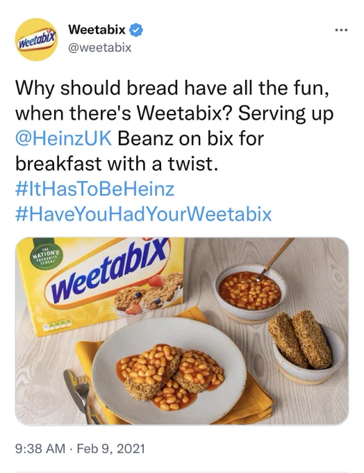 A 2021 tweet from Weetabix which shows Weetabix with baked beans on top.