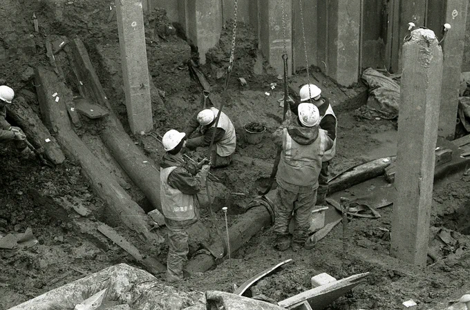 Multiple archaeologists undertaking excavation at the site of the Newport ship © Newport Museums and Heritage Service.