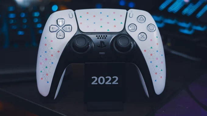 Special Employee DualSense Controller on a stand marked 2022.