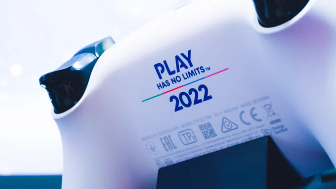 The bottom of a Special Employee DualSense Controller. The underplate reads "Play Has No Limits."