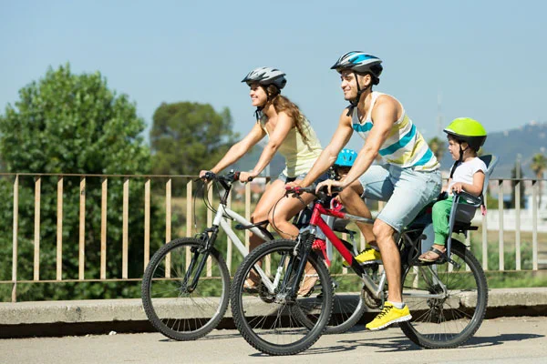 A family biking. The council has secured almost £15million for new safer biking routes in the county