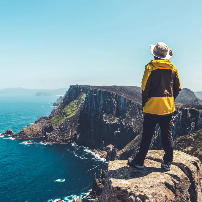 Traveller looking out at the ocean