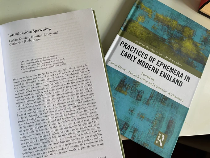 Two books, one open on a page reading “Introduction/Spawning” on the left and on right the front cover: an abstract print with plain strip reading: “Material Readings in early modern culture. Practices of Ephemera in early modern England. Edited by Callan Davies, Hannah Lilley, and Catherine Richardson”. A Routledge imprint is on bottom right.