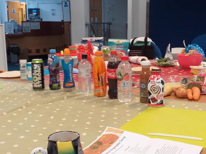 Photo of drink bottles including Lucozade, Ribena Light, Coca Cola, chocolate milk used for an activity to develop awareness of sugar in drinks